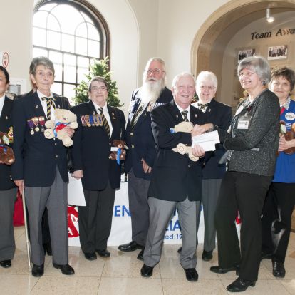 Members of the Royal Canadian Legion present their cheques as financial sponsors to members of the KGH Auxiliary
